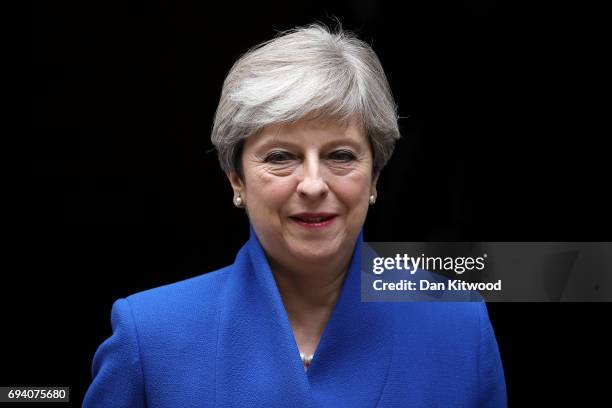 Prime Minister Theresa May leaves Downing Street to go to Buckingham Palace where she will seek the Queen's permission to form a UK government on...