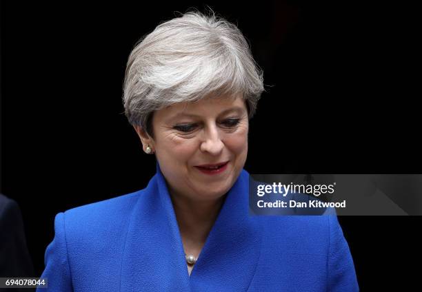 Prime Minister Theresa May leaves Downing Street to go to Buckingham Palace where she will seek the Queen's permission to form a UK government on...