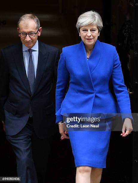 Prime Minister Theresa May leaves Downing Street with her husband Philip to go to Buckingham Palace where she will seek the Queen's permission to...