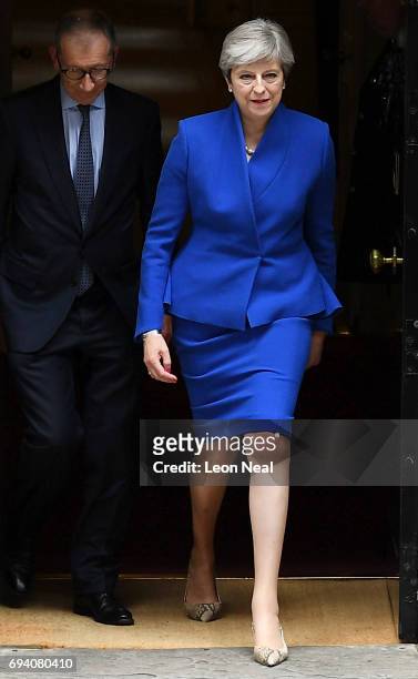 Prime Minister Theresa May leaves Downing Street with her husband Philip to go to Buckingham Palace where she will seek the Queen's permission to...