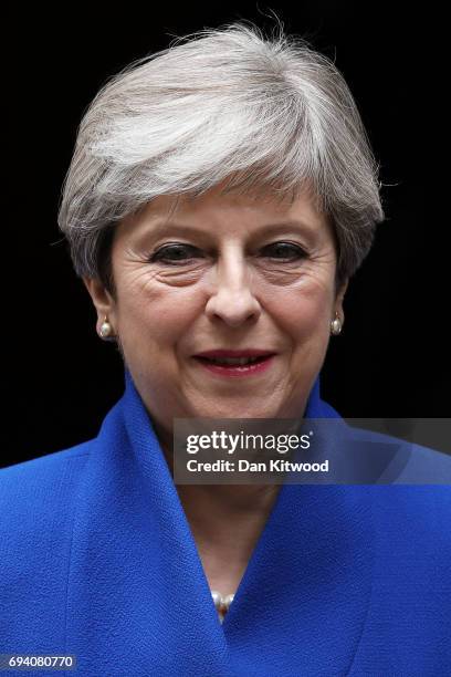 Prime Minister Theresa May leaves Downing Street to go to Buckingham Palace where she will seek the Queen's permission to form a UK government on...