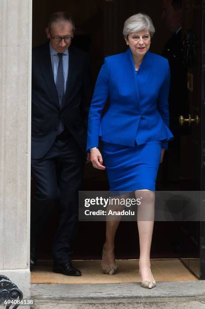 Phillip May and British Prime Minister Theresa May leaves No.10 Downing Street for a meeting with Queen Elizabeth II to seek permission to form a...