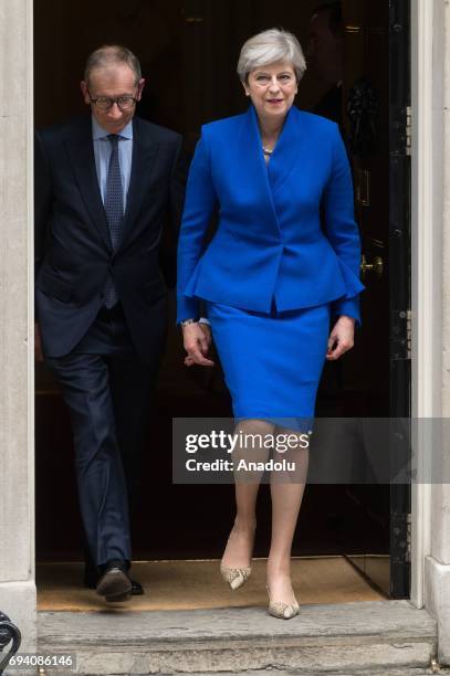Phillip May and British Prime Minister Theresa May leaves No.10 Downing Street for a meeting with Queen Elizabeth II to seek permission to form a...