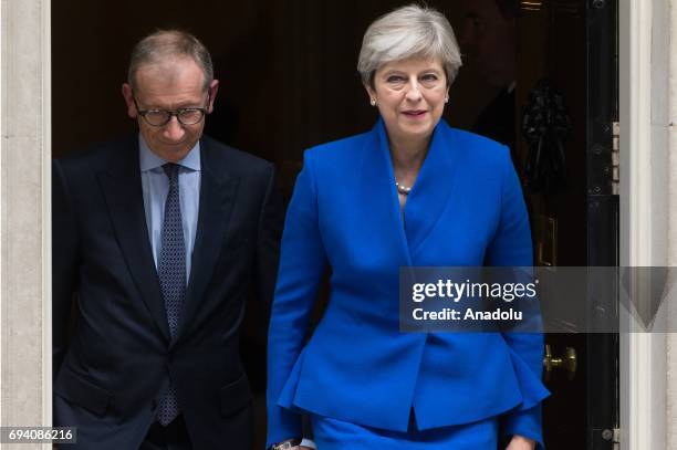 Phillip May and British Prime Minister Theresa May leaves No.10 Downing Street for a meeting with Queen Elizabeth II to seek permission to form a...