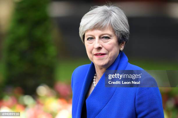 Prime Minister Theresa May speaks outside 10 Downing Street after returning from Buckingham Palace on June 9, 2017 in London, England. After a snap...