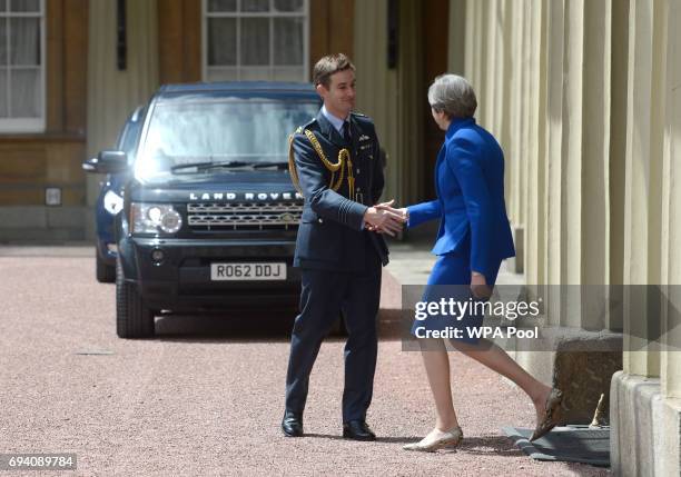 Prime Minister Theresa May leaves Buckingham Palace after a meeting with the Queen to seek permission to form a UK government on June 9, 2017 in...