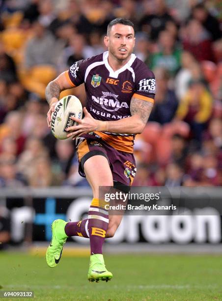 Darius Boyd of the Broncos runs with the ball during the round 14 NRL match between the Brisbane Broncos and the South Sydney Rabbitohs at Suncorp...