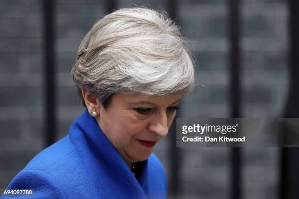 Prime Minister Theresa May leaves Downing Street to go to Buckingham Palace where she will seek the Queen's permission to form a UK government on...