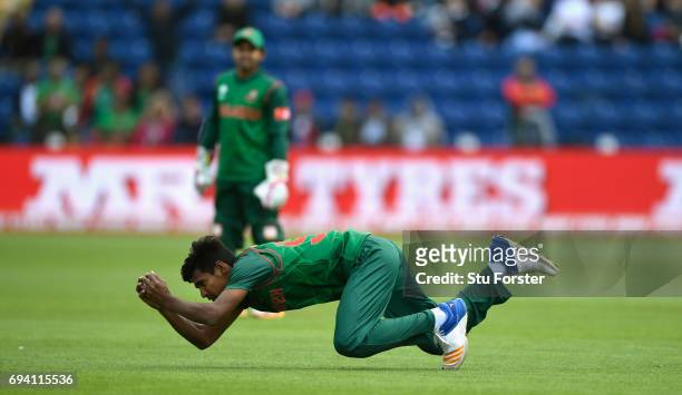 Bangladesh fielder Mustafizur Rahman swoops to catch Ross Taylor during the ICC Champions Trophy match between New Zealand and Bangladesh at SWALEC...