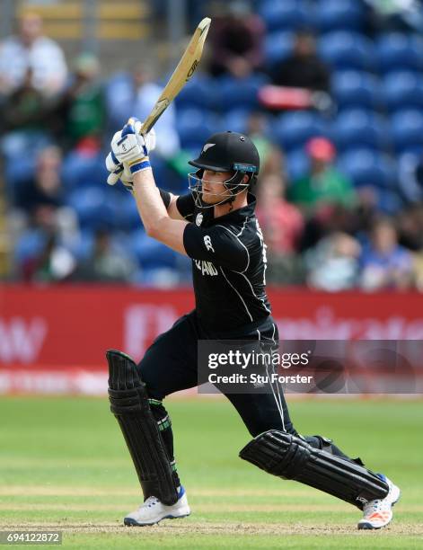 New Zealand batsman James Neesham hits out during the ICC Champions Trophy match between New Zealand and Bangladesh at SWALEC Stadium on June 9, 2017...