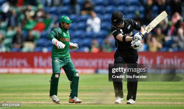 New Zealand batsman James Neesham reacts after being stumped by wicketkeeper Mushfiqur Rahim during the ICC Champions Trophy match between New...