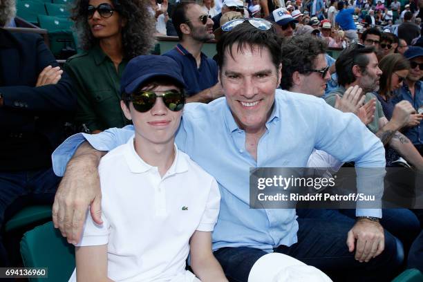 Actor Thomas Gibson and his son Travis Carter Gibson attend the 2017 French Tennis Open - Day Thirteen at Roland Garros on June 9, 2017 in Paris,...