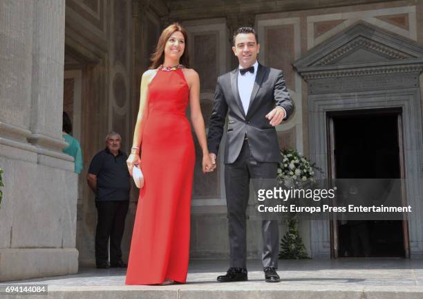 Xavi Hernandez and Nuria Cunillera attend the wedding of the goalkeeper Victor Valdes and Yolanda Cardona on June 9, 2017 in Barcelona, Spain.
