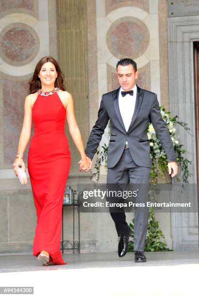 Xavi Hernandez and Nuria Cunillera attend the wedding of the goalkeeper Victor Valdes and Yolanda Cardona on June 9, 2017 in Barcelona, Spain.