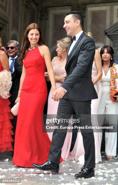 Xavi Hernandez and Nuria Cunillera attend the wedding of the goalkeeper Victor Valdes and Yolanda Cardona on June 9, 2017 in Barcelona, Spain.