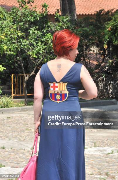 Guest wearing a dress with Barcelona fooball club emblem attends the wedding of the goalkeeper Victor Valdes and Yolanda Cardona on June 9, 2017 in...