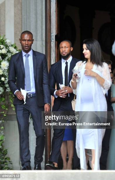 Seydou Keita and Eric Abidal attend the wedding of the goalkeeper Victor Valdes and Yolanda Cardona on June 9, 2017 in Barcelona, Spain.