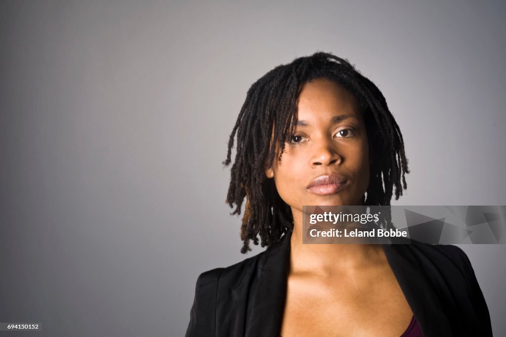 Portrait of M fixed Race Woman with Dreds