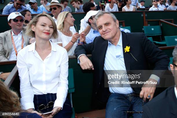 Stylist Jean-Charles de Castelbajac and guest attend the 2017 French Tennis Open - Day Thirteen at Roland Garros on June 9, 2017 in Paris, France.