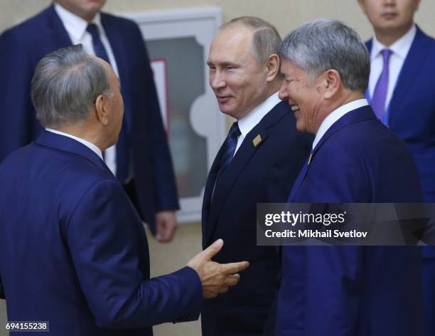 Russian President Vladimir Putin , Kazakh President Nursultan Nazarbayev and Kyrgyz President Almazbek Atambayev arrive to a group photo session...