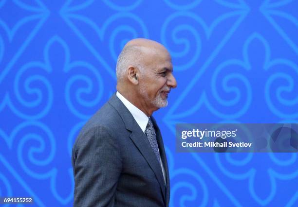 Afghan President Ashraf Ghani arrives to the welcoming ceremony during the SCO Summit Meeting in Astana, Kazakhstan, June 2017. Russian President...