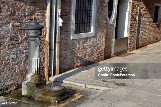 drinking water source - veneza stock pictures, royalty-free photos & images