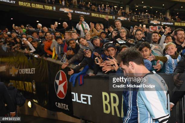 Lionel Messi of Argentina leaves the pitch during the Brasil Global Tour match between Brazil and Argentina at Melbourne Cricket Ground on June 9,...
