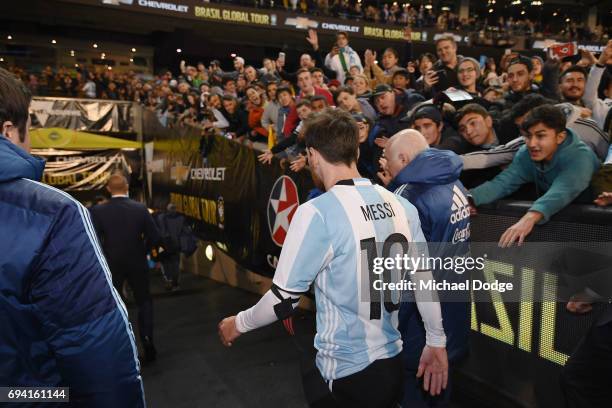 Lionel Messi of Argentina leaves the pitch during the Brasil Global Tour match between Brazil and Argentina at Melbourne Cricket Ground on June 9,...