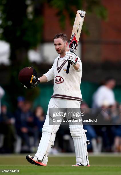 Mark Stoneman of Surrey celebrates his century during the Specsavers County Championship Division One match between Surrey and Essex at Guildford...