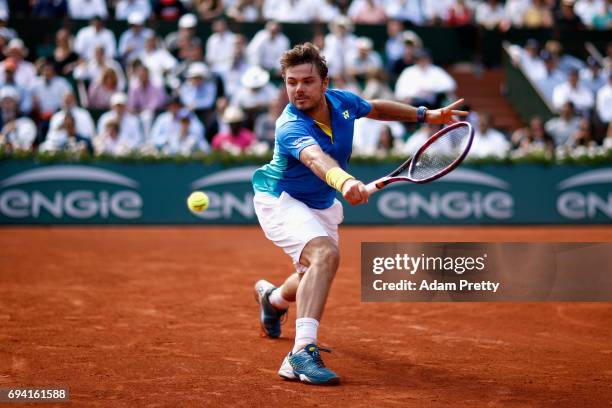 Stan Wawrinka of Switzerland plays a backhand during mens singles semi-final match against Andy Murray of Great Britain on day thirteen of the 2017...