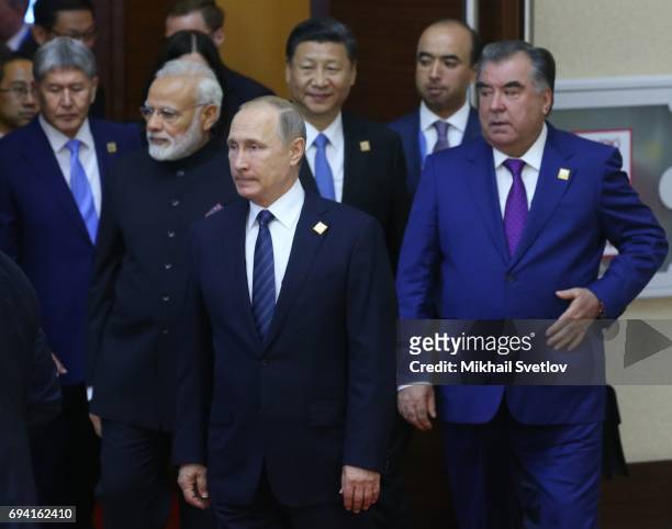 Russian President Vladimir Putin , Tajik President Emomali Rakhmon , Indian Prime Minister Narendra Modi , Chinese President Xi Jinping arrive to the...