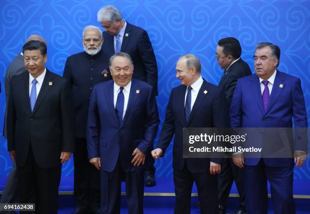 Russian President Vladimir Putin , Kazakh President Nursultan Nazarbayev , Tajik President Emomali Rakhmon , Indian Prime Minister Narendra Modi and...