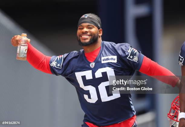 New England Patriots player Elandon Roberts poses for the cameras as he arrives for the team's Minicamp practice at Gillette Stadium in Foxborough,...