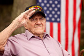World War Two, Veteran wearing cap with text, 
