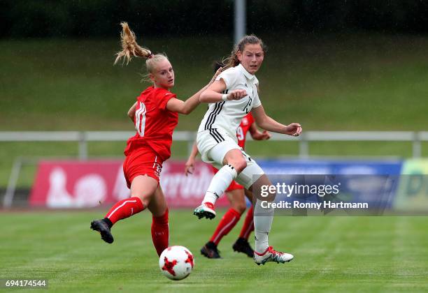 Sarai Linder of Germany competes with Alisha Lehmann of Switzerland during the U19 women's elite round match between Germany and Switzerland at...