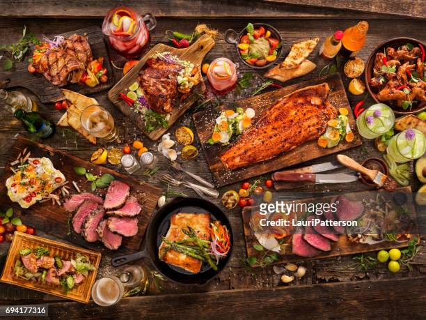 bbq feast - dinner party stock pictures, royalty-free photos & images