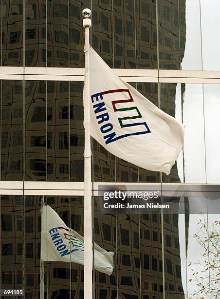 The Enron corporate flag waves in front of the companys headquarters January 23, 2002 in Houston, TX. Federal prosecuters and the FBI are...