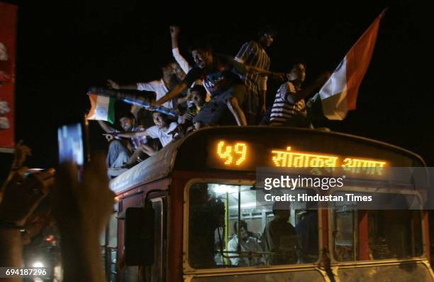 Cricket fans get on the streets of Mumbai after India's victory in final match against Sri Lanka in Cricket World Cup 2011.