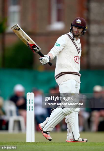 Mark Stoneman of Surrey celebrates his 150 during the Specsavers County Championship Division One match between Surrey and Essex at Guildford Cricket...