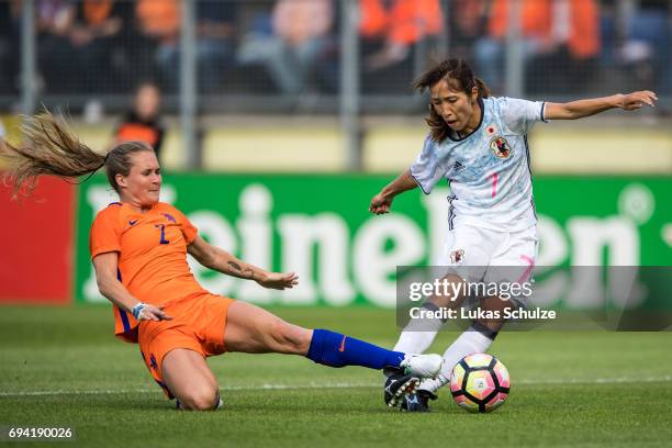 Desiree van Lunteren of Netherlands and Emi Nakajima of Japan fight for the ball during the Women's International Friendly match between Netherlands...