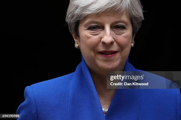 Prime Minister Theresa May leaves Downing Street to go to Buckingham Palace where she will seek the Queen's permission to form a UK government on...