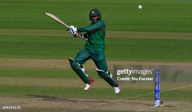 Bangladesh batsman Shakib Al Hasan hits out during the ICC Champions Trophy match between New Zealand and Bangladesh at SWALEC Stadium on June 9,...