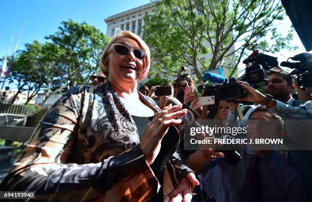 Samantha Geimer speaks to the press before entering the courthouse in Los Angeles, California on June 9, 2017. Geimer is expected to ask the court to...