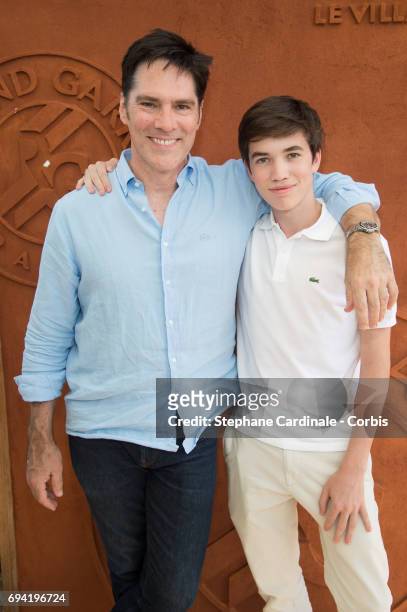 Actor Thomas Gibson and his son Travis Carter Gibson attend the French Tennis Open 2017 - Day Thirteen at Roland Garros on June 9, 2017 in Paris,...