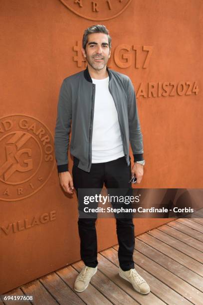 Humorist Ary Abittan attends the French Tennis Open 2017 - Day Thirteen at Roland Garros on June 9, 2017 in Paris, France.