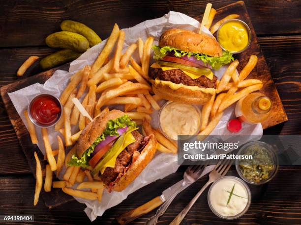 burgers and fries - french fries stock pictures, royalty-free photos & images