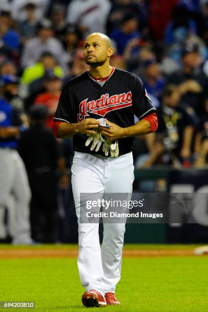 Leftfielder Coco Crisp of the Cleveland Indians walks off the field after the fourth inning of Game 6 of the World Series against the Chicago Cubs on...