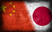 China and Japan flag with grunge metal texture