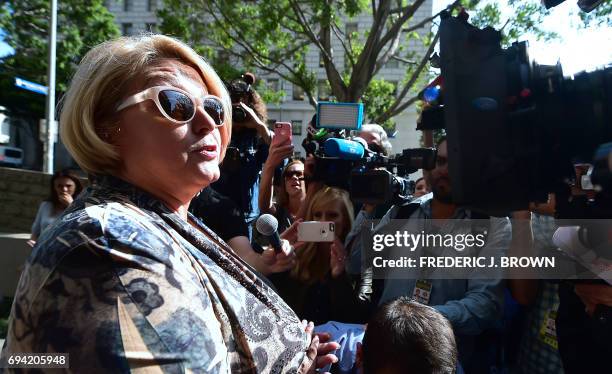 Samantha Geimer speaks to the press before entering the courthouse in Los Angeles, California on June 9, 2017. Geimer is expected to ask the court to...