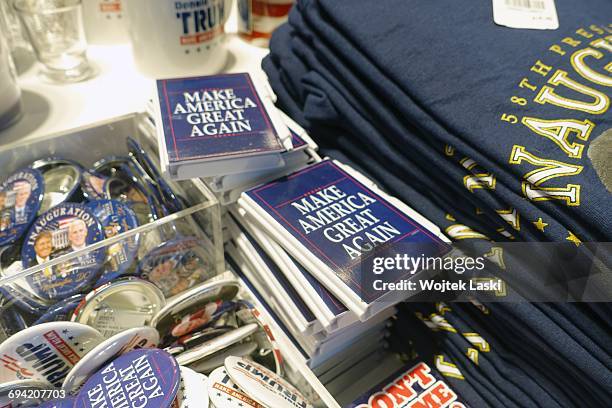 Trump Things Donald Trump badges and T-shirts on sale in a gadget and souvenir... News Photo - Getty Images